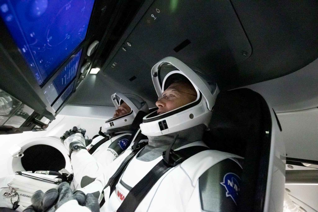 Astronauts Robert Behnken and Douglas Hurley in Space X Dragon