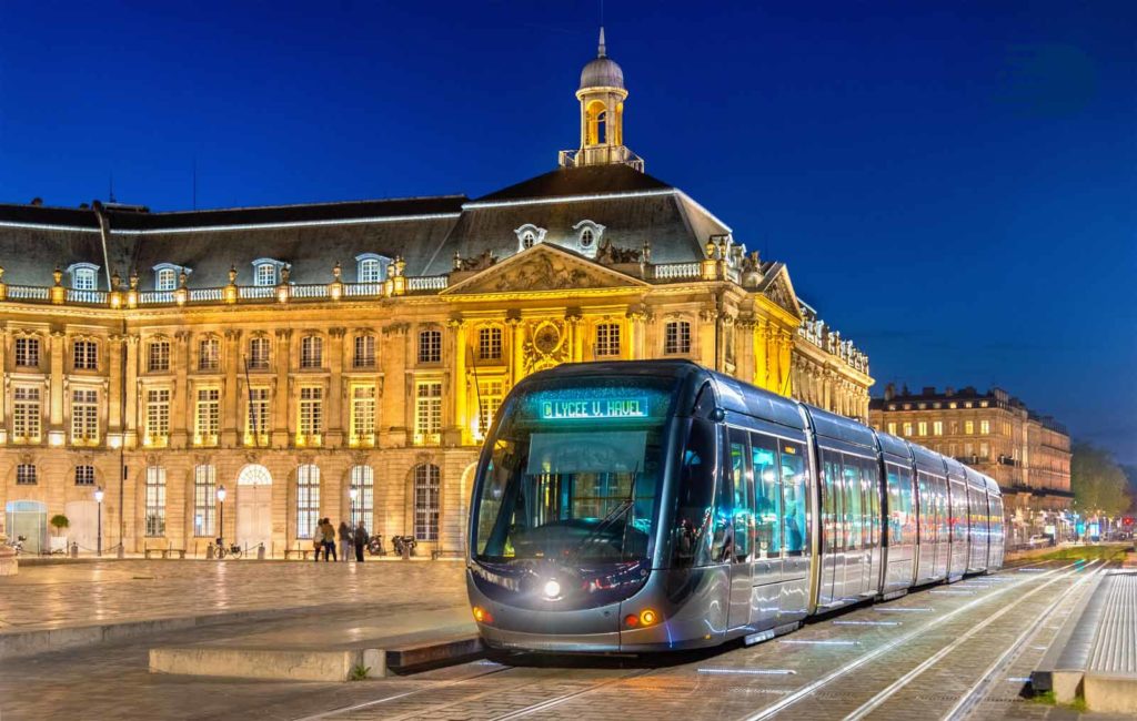 a tram on the street in Bordeaux France