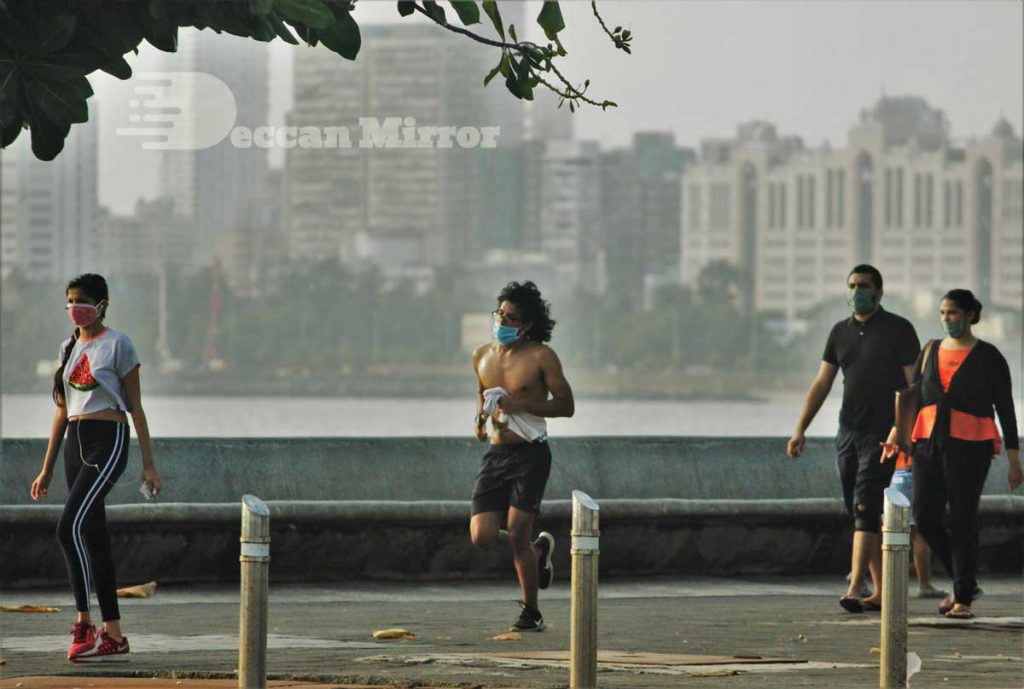 Joggers in India during COVID wearing masks