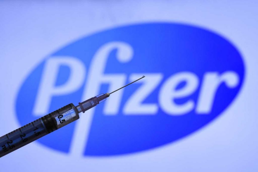 Pfizer Company Logo and a Injection in front of it