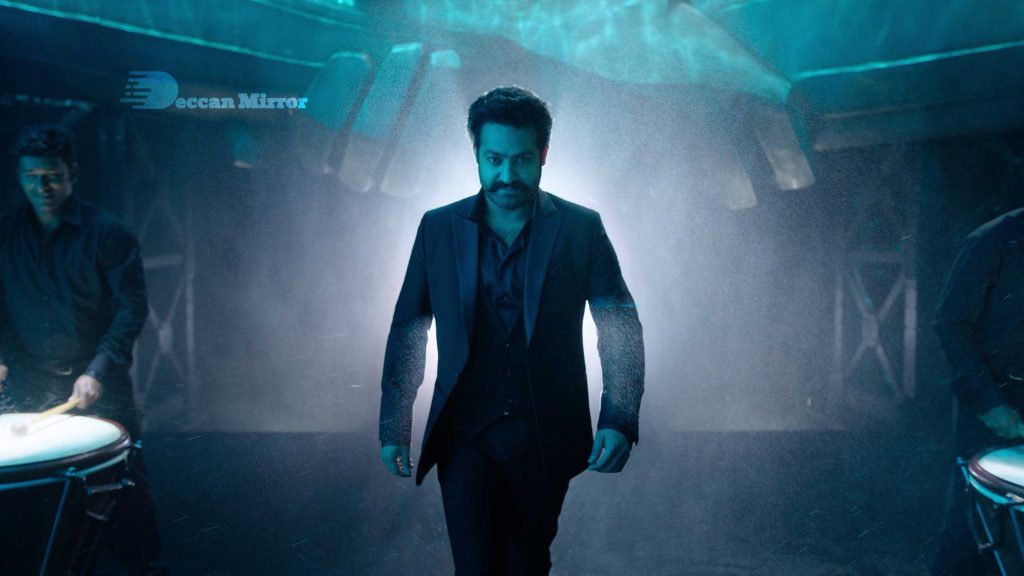 Junior NTR, dressed in black suit, makes a special appearance in the promotional video for the movie RRR featuring Dosti song