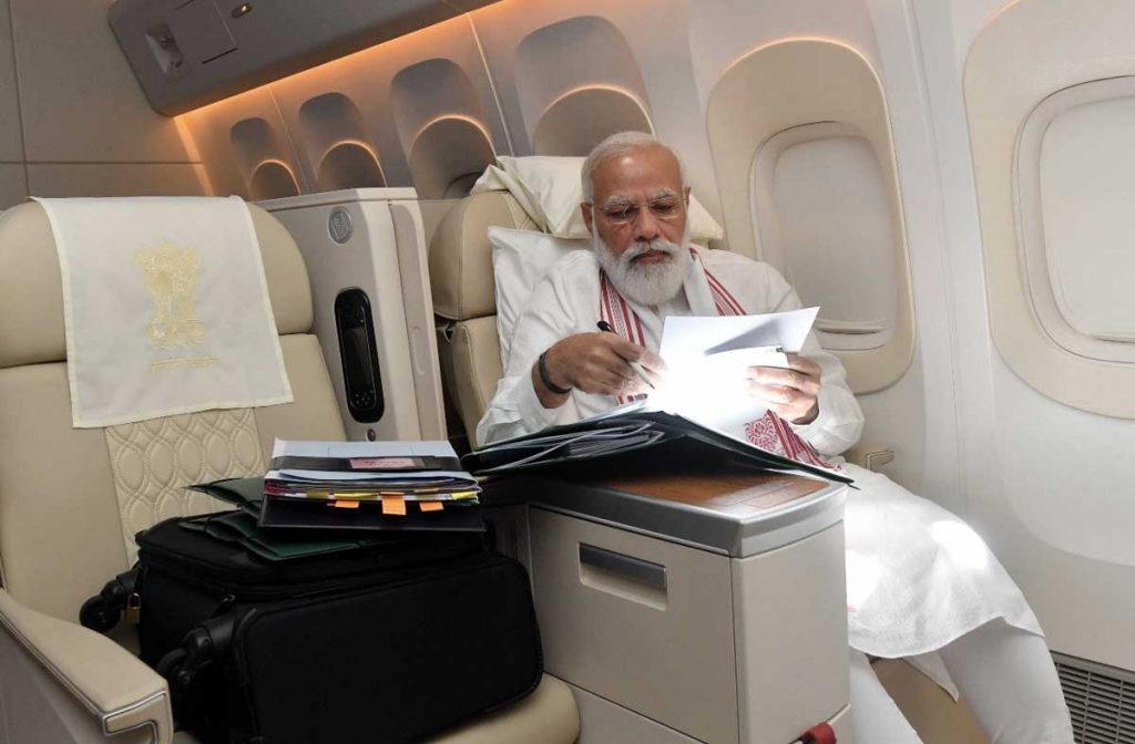 Prime Minister Modi at work on the way to the US