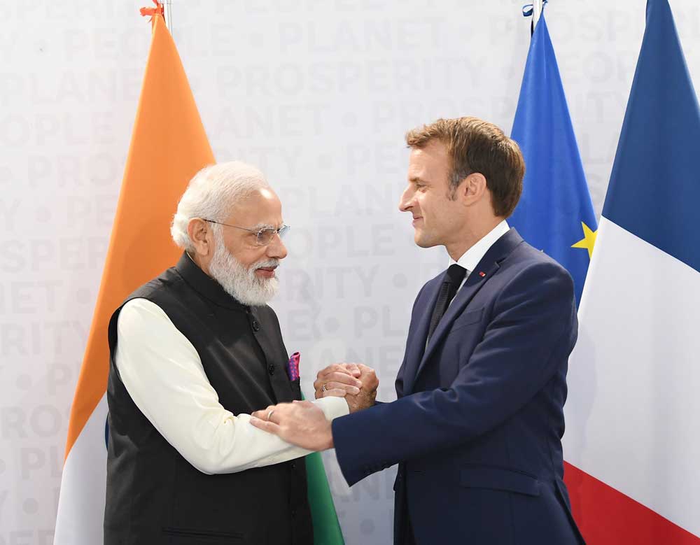 Prime Minister Modi with the French President Emmanuel Macron