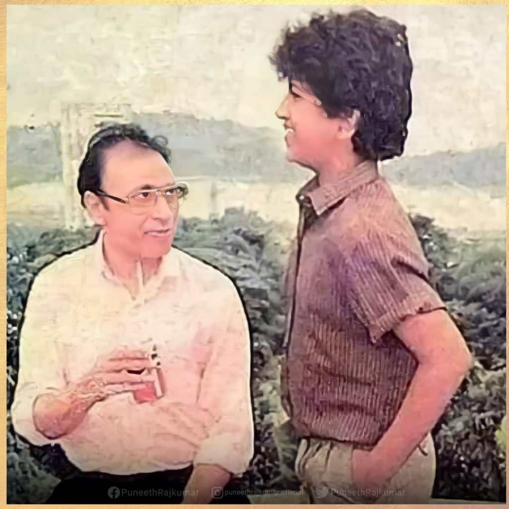 Puneeth Rajkumar and his father 
