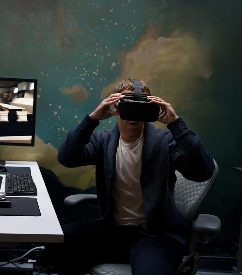 Mark Zuckerberg uses a VR Headset