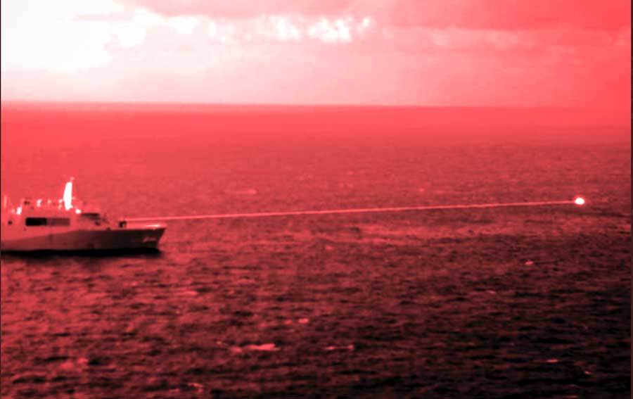 USS-Portland-firing-a-laser-at-its-target-in-the-Gulf-of-Aden