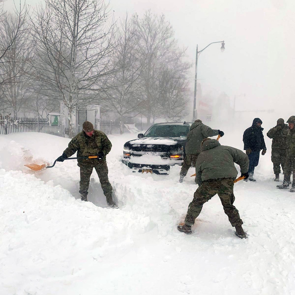 NY National Guard remove snow from streets