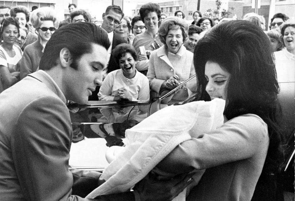 Elvis and Priscilla with Lisa Marie