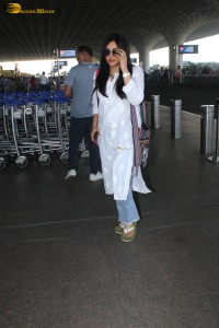 actress adah sharma in a white kurti at mumbai airport