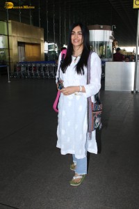 actress adah sharma in a white kurti at mumbai airport