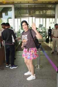 actress adah sharma chic looks in a brown top and a pink skirt at airport
