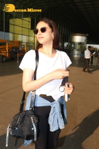 Aditi Rao Hydari in a White T-Shirt and Black Jeans at Airport