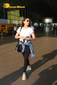 Aditi Rao Hydari in a White T-Shirt and Black Jeans at Airport