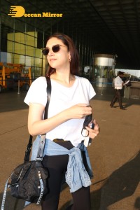 Aditi Rao Hydari in a White T-Shirt and Black Jeans at Airport