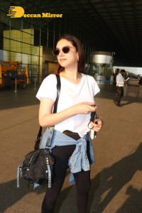 Aditi Rao Hydari in a White T-Shirt and Black Jeans at Airport
