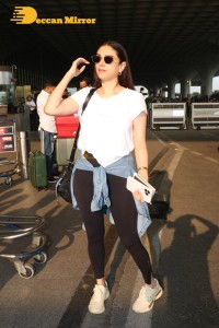 Aditi Rao Hydari in a White T-Shirt and Black Jeans at Airport