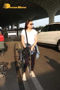 Aditi Rao Hydari in a White T-Shirt and Black Jeans at Airport