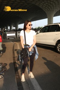 Aditi Rao Hydari in a White T-Shirt and Black Jeans at Airport
