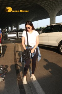 Aditi Rao Hydari in a White T-Shirt and Black Jeans at Airport