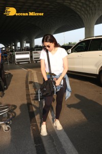 Aditi Rao Hydari in a White T-Shirt and Black Jeans at Airport