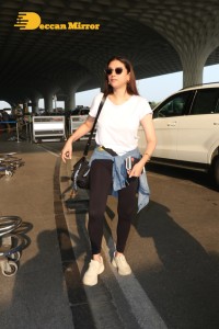 Aditi Rao Hydari in a White T-Shirt and Black Jeans at Airport