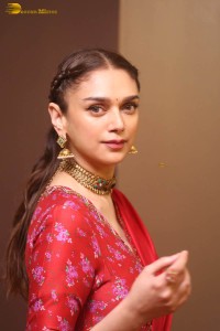 Indian actress Aditi Rao Hydari in a red lehenga choli dress