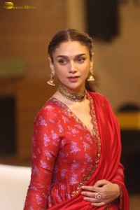 Indian actress Aditi Rao Hydari in a red lehenga choli dress
