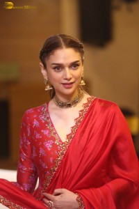 Indian actress Aditi Rao Hydari in a red lehenga choli dress