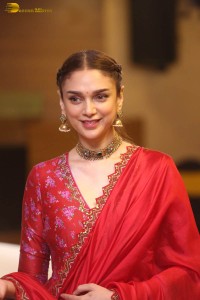 Indian actress Aditi Rao Hydari in a red lehenga choli dress
