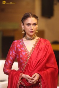 Indian actress Aditi Rao Hydari in a red lehenga choli dress