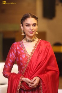 Indian actress Aditi Rao Hydari in a red lehenga choli dress