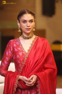 Indian actress Aditi Rao Hydari in a red lehenga choli dress