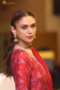 Indian actress Aditi Rao Hydari in a red lehenga choli dress
