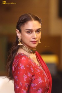 Indian actress Aditi Rao Hydari in a red lehenga choli dress