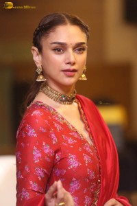 Indian actress Aditi Rao Hydari in a red lehenga choli dress
