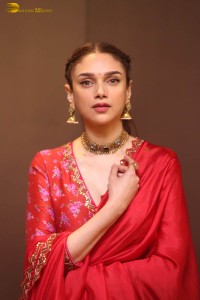 Indian actress Aditi Rao Hydari in a red lehenga choli dress