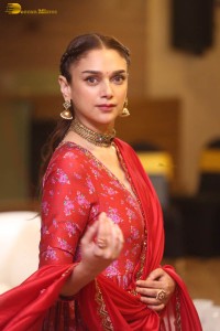 Indian actress Aditi Rao Hydari in a red lehenga choli dress