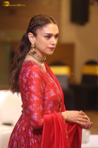 Indian actress Aditi Rao Hydari in a red lehenga choli dress