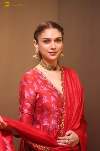 Indian actress Aditi Rao Hydari in a red lehenga choli dress