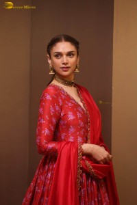 Indian actress Aditi Rao Hydari in a red lehenga choli dress