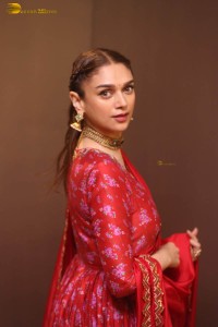 Indian actress Aditi Rao Hydari in a red lehenga choli dress