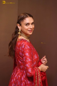 Indian actress Aditi Rao Hydari in a red lehenga choli dress