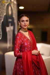 Indian actress Aditi Rao Hydari in a red lehenga choli dress