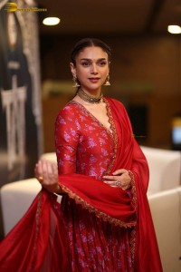 Indian actress Aditi Rao Hydari in a red lehenga choli dress
