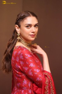 Indian actress Aditi Rao Hydari in a red lehenga choli dress