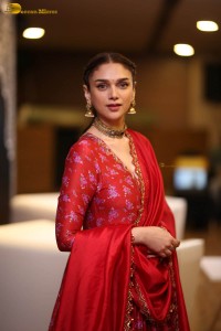 Indian actress Aditi Rao Hydari in a red lehenga choli dress