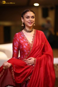 Indian actress Aditi Rao Hydari in a red lehenga choli dress