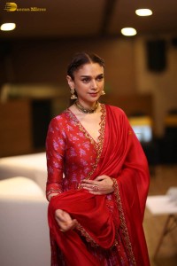 Indian actress Aditi Rao Hydari in a red lehenga choli dress