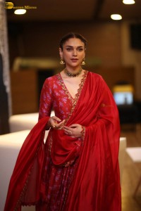 Indian actress Aditi Rao Hydari in a red lehenga choli dress