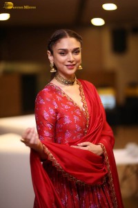 Indian actress Aditi Rao Hydari in a red lehenga choli dress